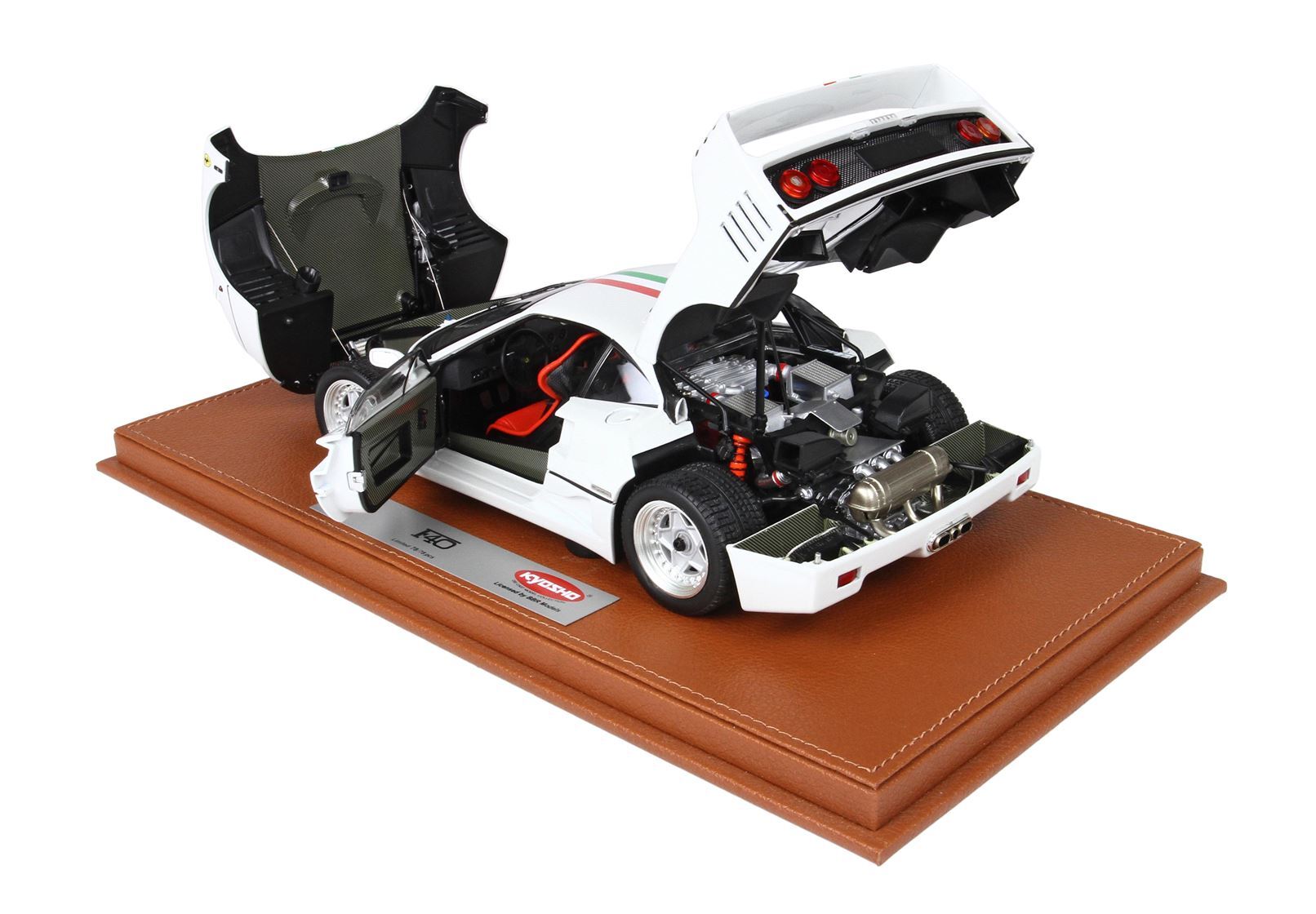 White Kyosho Ferrari F40 model car with doors, hood, and trunk open on brown leather base, available on Vroomi