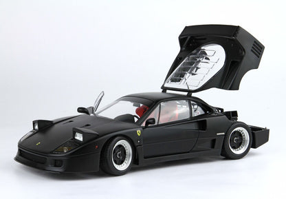 Matte black Ferrari F40 model with open rear engine cover and driver door, available on Vroomi