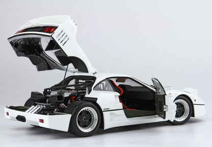 White sports car model with doors and rear hood open showing interior and engine, available on Vroomi