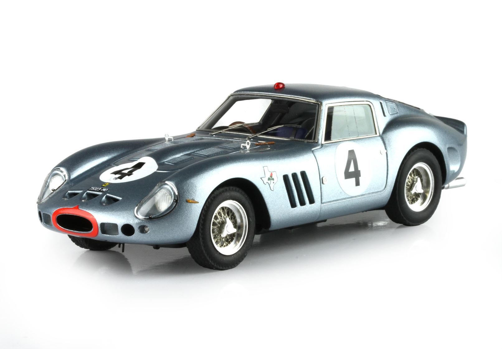 Silver classic race car model with number 4, detailed wheels and front grille, available on Vroomi