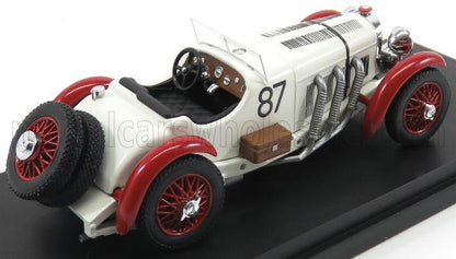 Modello di auto da corsa vintage bianca con ruote rosse, numero 87 e tubi di scarico laterali, presente su Vroomi.