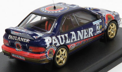 Modello di auto da rally Subaru in scala 1/18 con livrea Paulaner, ruote dorate, disponibile per ordine .