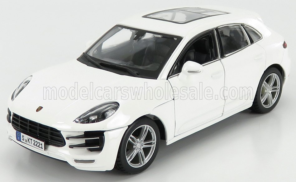 Modellino di Porsche Macan bianca con portiera del guidatore aperta, interni dettagliati e tetto apribile, disponibile su Vroomi.