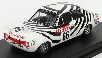 Modellino in scala 1/18 dell'auto da rally Ford Escort con livrea bianca e nera, disponibile per i collezionisti su Vroomi.
