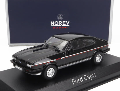 Modellino Ford Capri Norev nero con striscia rossa su espositore, disponibile su Vroomi.