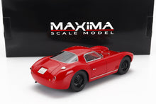 Red vintage sports car scale model with black wheels in front of Maxima scale model box, available on Vroomi
