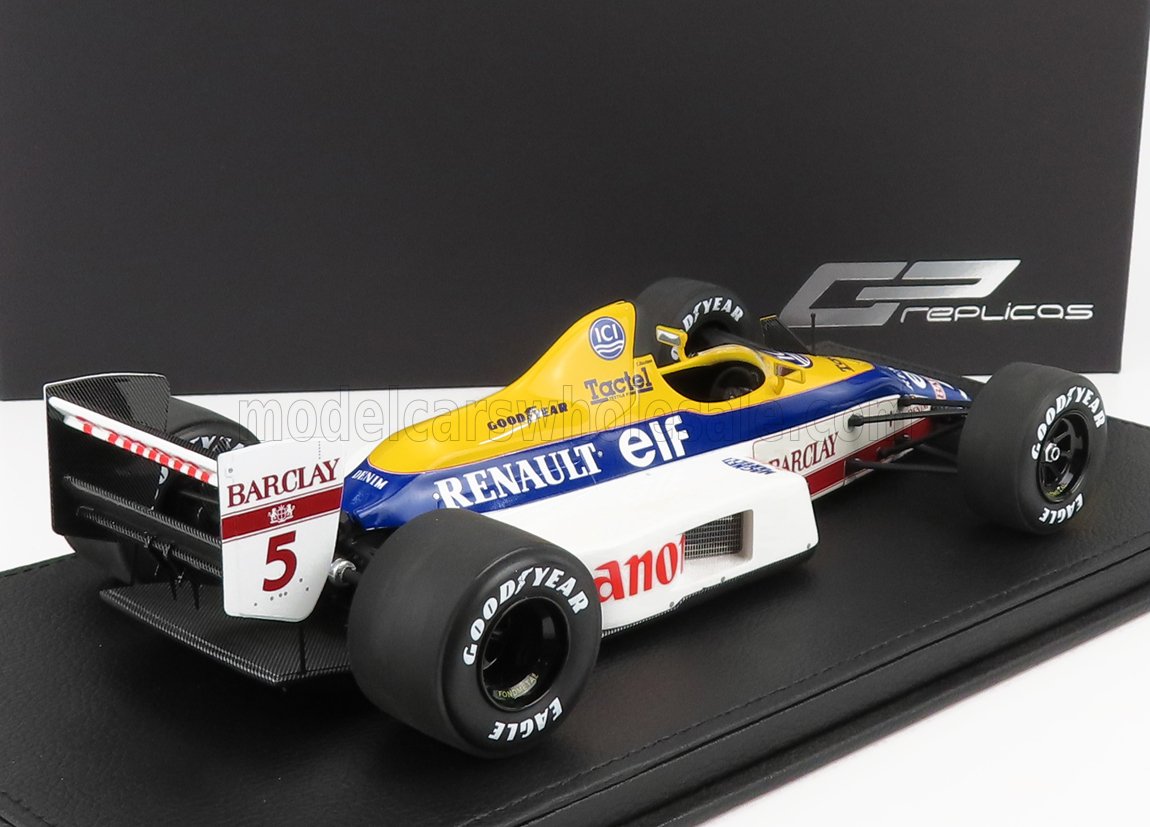 Modellino in scala della Williams Renault F1 del 1990 gialla, blu e bianca in mostra, disponibile su Vroomi.