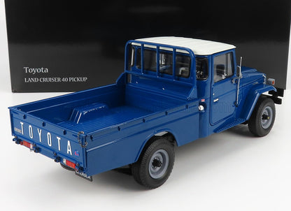 Toyota Land Cruiser 40 Pickup blu con tetto bianco, disponibile su Vroomi.