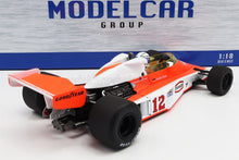 Modellino di auto vintage di Formula 1 in scala 1:18, numero 12, con pneumatici Goodyear e marchio Texaco, disponibile su Vroomi.