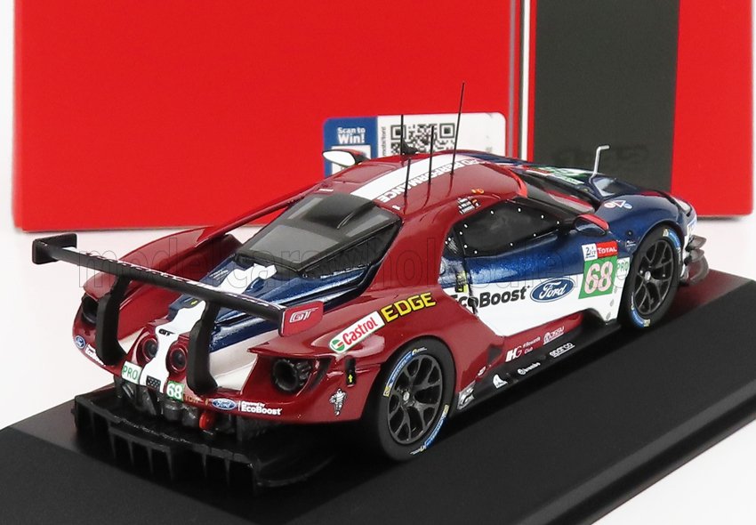 Modello dettagliato dell'auto da corsa Ford GT rossa, bianca e blu con spoiler, adesivi e numeri da gara, disponibile su Vroomi.