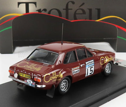 Modello classico dell'auto da corsa Ford Escort con livrea Gold Leaf Lighters, numero 15, disponibile su Vroomi.