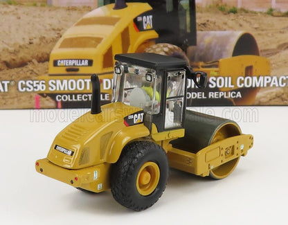 Replica del modello di rullo compattatore Caterpillar CS56 con tamburo liscio in giallo, disponibile su Vroomi.