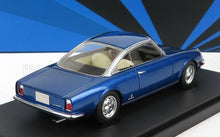 Blue classic Ferrari 250 GT model car with silver roof and cream interior, showcased with Vroomi availability