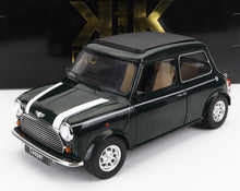 Modellino di auto Mini Cooper classica verde scuro con strisce bianche da corsa e interni color cuoio, disponibile su Vroomi.