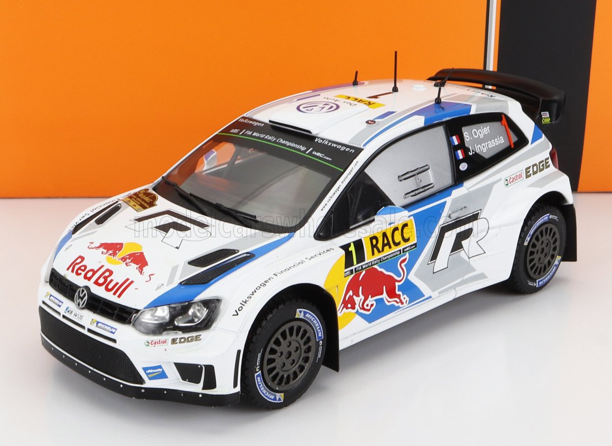 Auto da rally Volkswagen Polo R WRC bianca con Red Bull su sfondo arancione, disponibile su Vroomi.