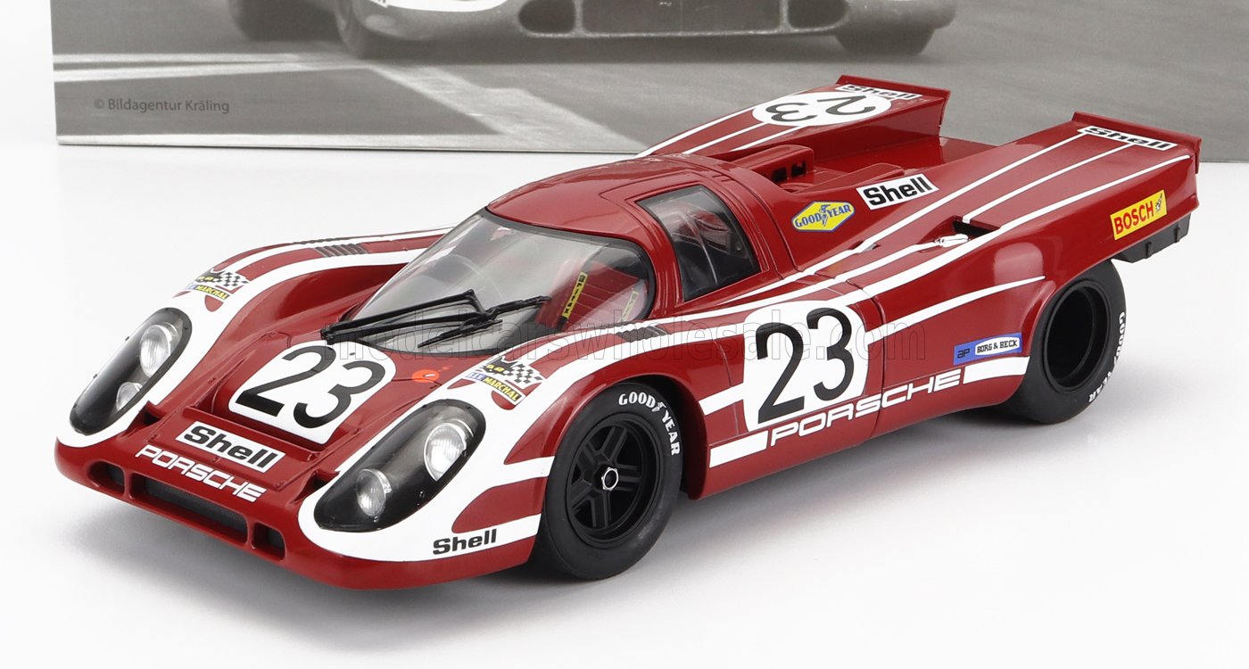 Modellino di auto da corsa Porsche 917 rossa e bianca con il numero 23 e i loghi degli sponsor, in vendita su Vroomi.