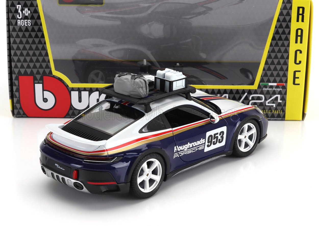 Modellino Porsche 953 in metallo pressofuso con portapacchi sul tetto, decalcomania da gara blu navy e bianca, disponibile su Vroomi.