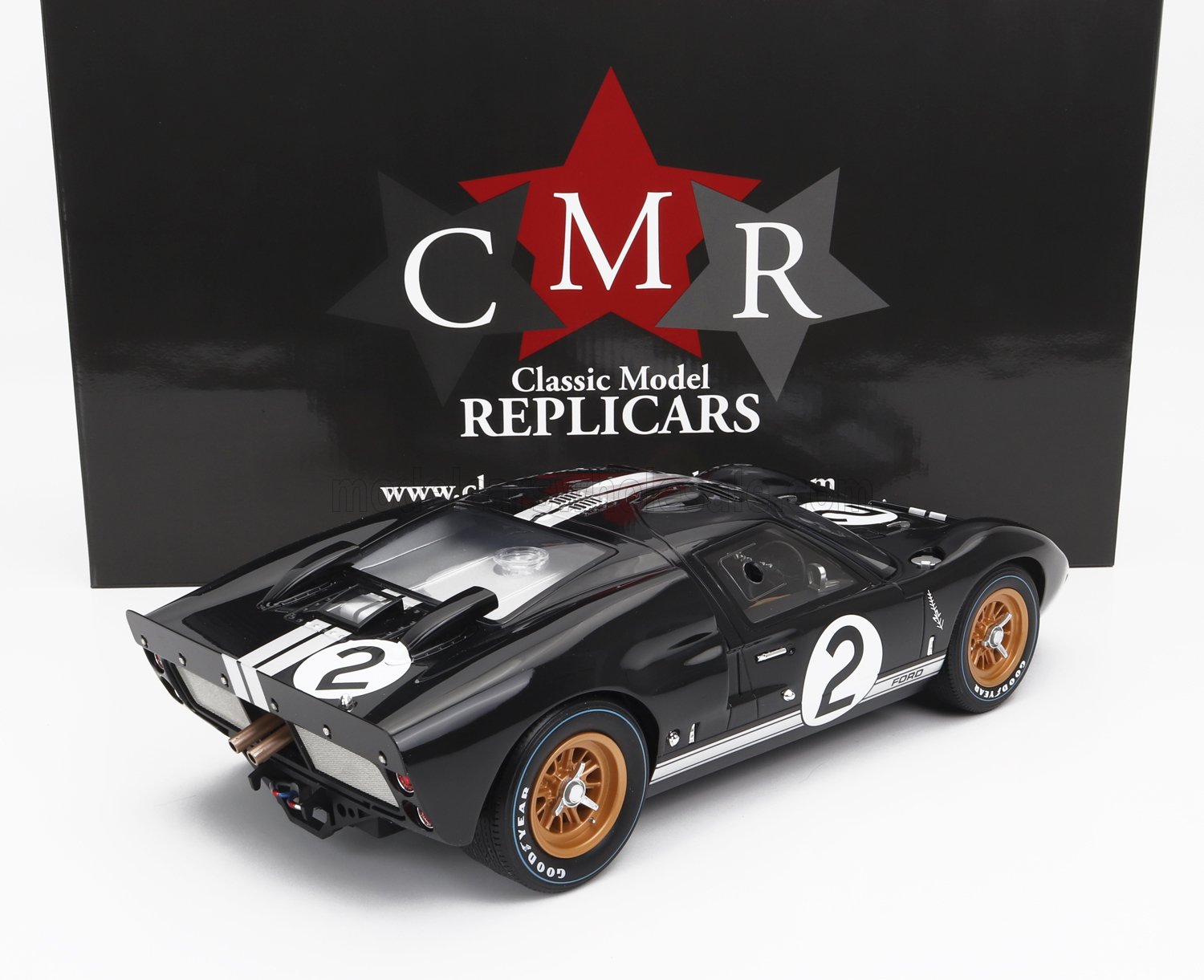 Black classic Ford GT40 race car model with number 2 and gold wheels, offered on Vroomi