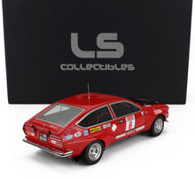 Modellino di auto da rally Alfa Romeo rossa con adesivi degli sponsor e numero 6, esposto con scatola LS Collectibles, disponibile anche su Vroomi.