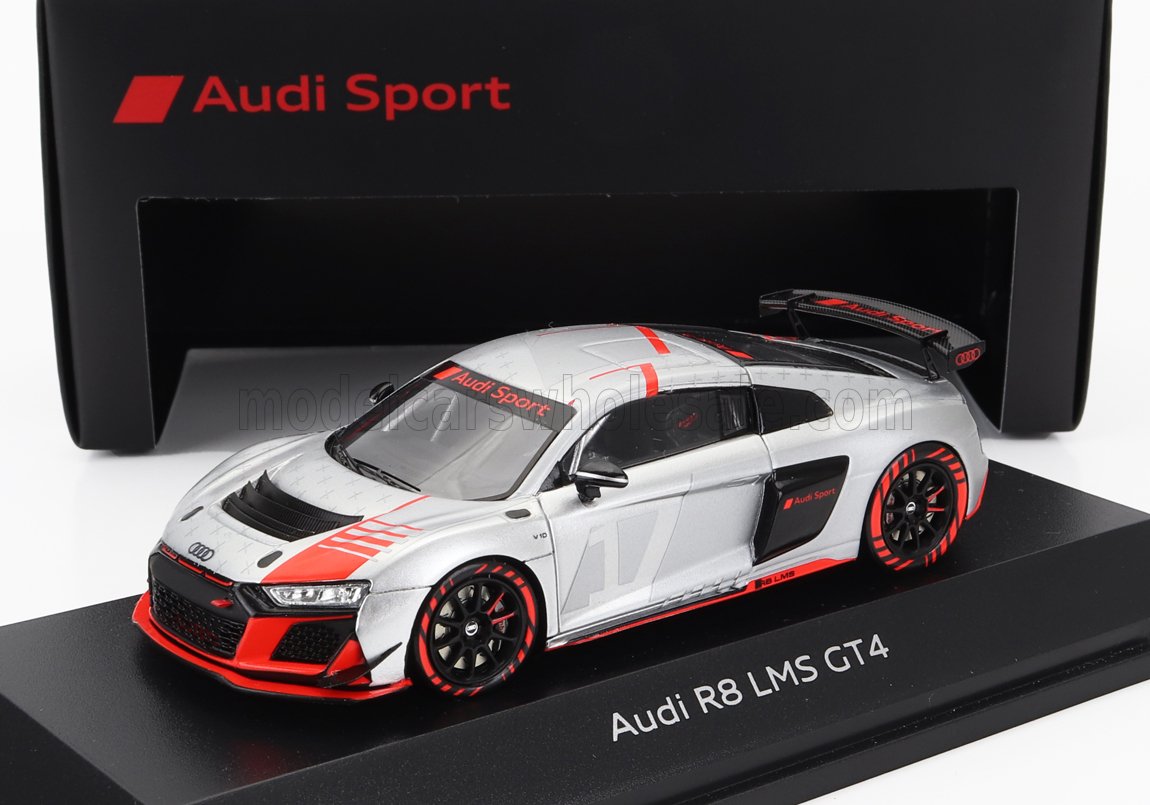 Modellino dell'auto da corsa Audi R8 LMS GT4 rosso argento su espositore con marchio Audi Sport, disponibile su Vroomi.