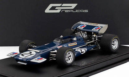 Modellino vintage blu di un'auto da corsa Ford Formula 1 con i loghi Dunlop ed Elf, esposto su una base nera, disponibile su Vroomi.