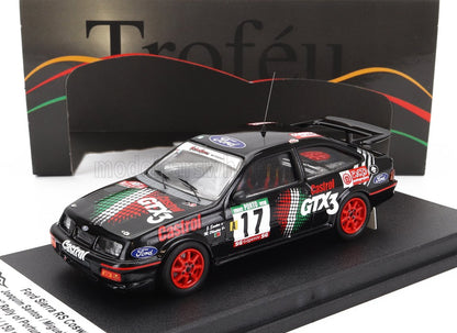 Modello di auto da rally Ford Sierra RS Cosworth con livrea Castrol GTX3 e ruote rosse, disponibile su Vroomi.