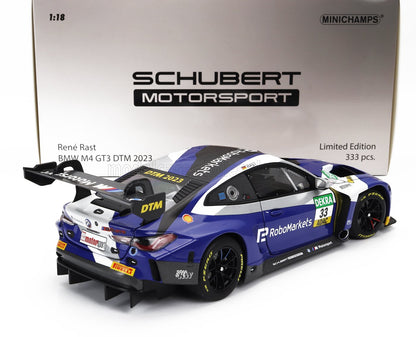 Modello di auto da corsa BMW M4 GT3 DTM 2023 in scala 1:18 di Schubert Motorsport, edizione René Rast, solo 333 pezzi, disponibile su Vroomi.