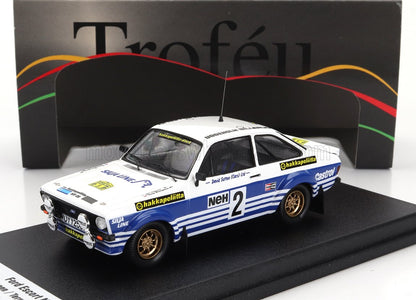 Modello di auto da rally Ford Escort Mk2 con adesivi Hakkapeliitta e Castrol, disponibile tramite Vroomi.