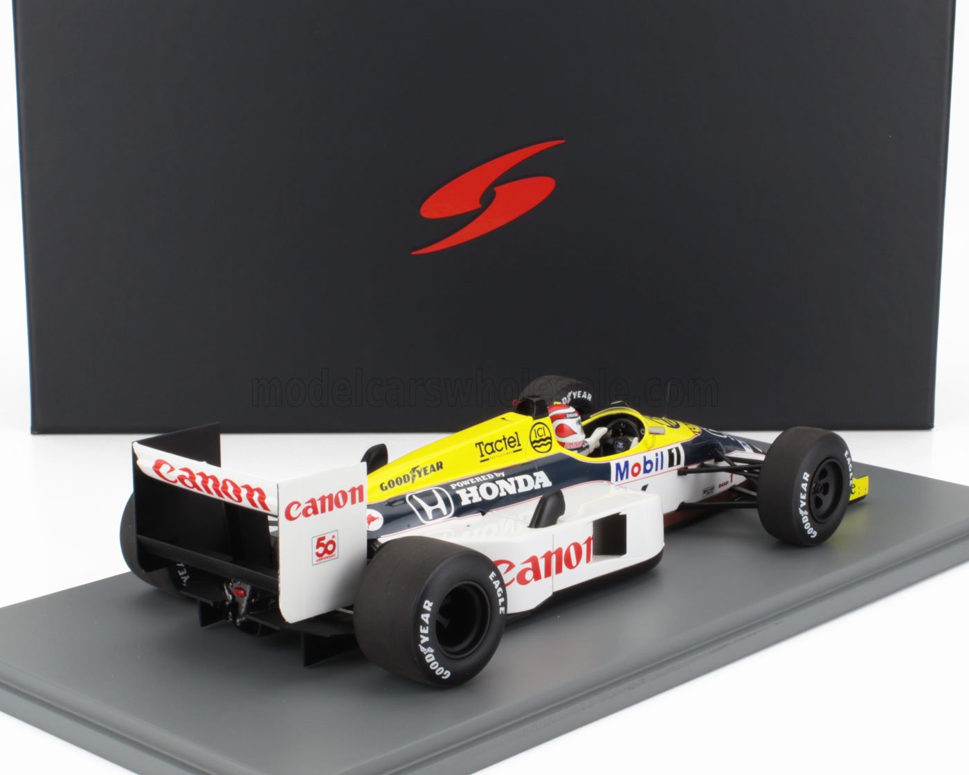 Modello in scala della macchina da corsa Williams Honda Formula 1 con il marchio Canon in mostra, disponibile su Vroomi.