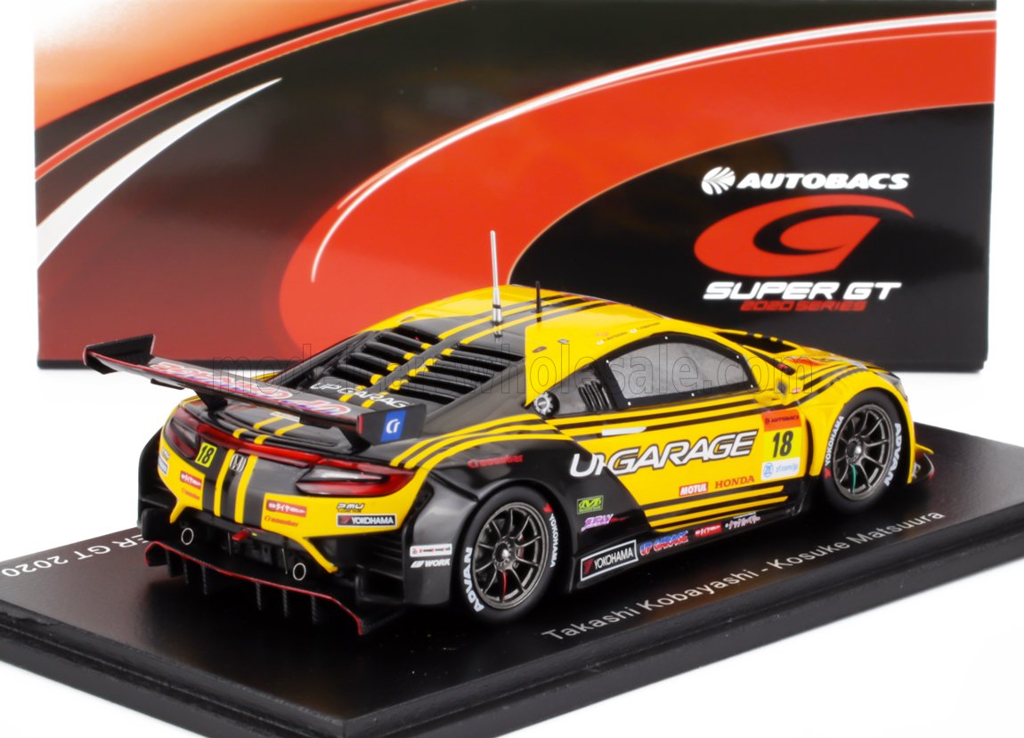 Modellino di auto da corsa U-Garage giallo e nero della serie Super GT, presente sulla piattaforma Vroomi.