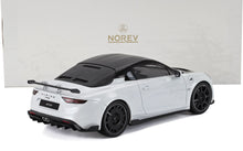 Modellino di auto Alpine bianca con tetto nero e spoiler posteriore, disponibile sulla piattaforma Vroomi.