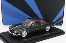 Dark green Chevrolet Corvair Coupe Pininfarina model car displayed on stand with blue and black background, now accessible on Vroomi