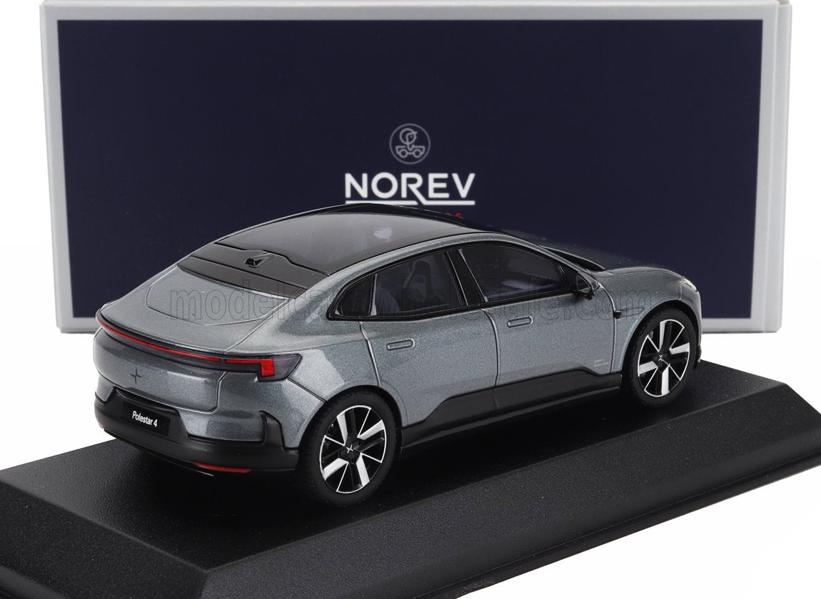 Modellino di auto Polestar 4 grigio su espositore con scatola Norev, disponibile su Vroomi