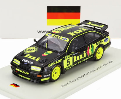Modellino Ford Sierra RS500 Cosworth DTM 1988 nero e giallo neon con adesivi da corsa, presentato su Vroomi.