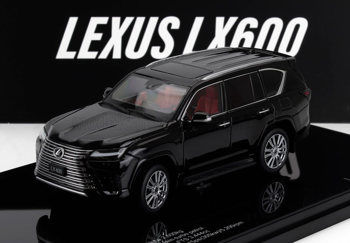 Modellino di Lexus LX600 nero con interni rossi esposto su un supporto, disponibile tramite Vroomi.