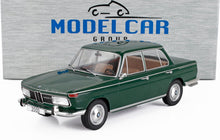 Modellino in scala della BMW 2000 ti verde con interni marroni, disponibile da Vroomi.