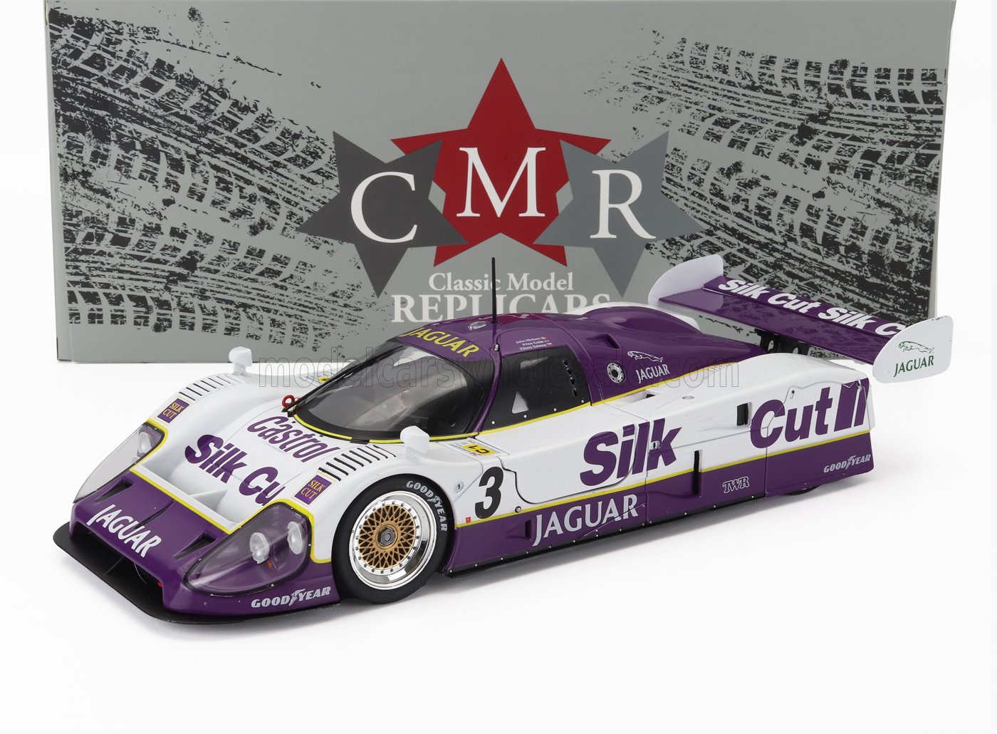 Modellino di auto da corsa Jaguar Cut viola e bianca con adesivi dettagliati, ora disponibile tramite Vroomi.