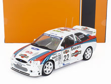 Modellino di auto da corsa Ford Escort Martini in scala 1/18, bianco con adesivi da corsa, da collezione, disponibile online.