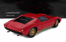 Modellino in scala 1:400 della Lamborghini Miura rossa con cerchi dorati, oggetto da collezione disponibile su Vroomi.