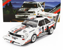Modellino in scala 1/18 dell'Audi Quattro Pikes Peak 1987 con livrea da gara, disponibile su Vroomi.