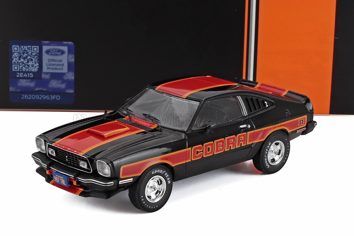 Black and red Ford Cobra muscle car model with orange stripes, available on Vroomi platform