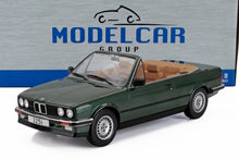 Modellino in scala di BMW 325i cabriolet verde con interni color cuoio, disponibile su Vroomi.