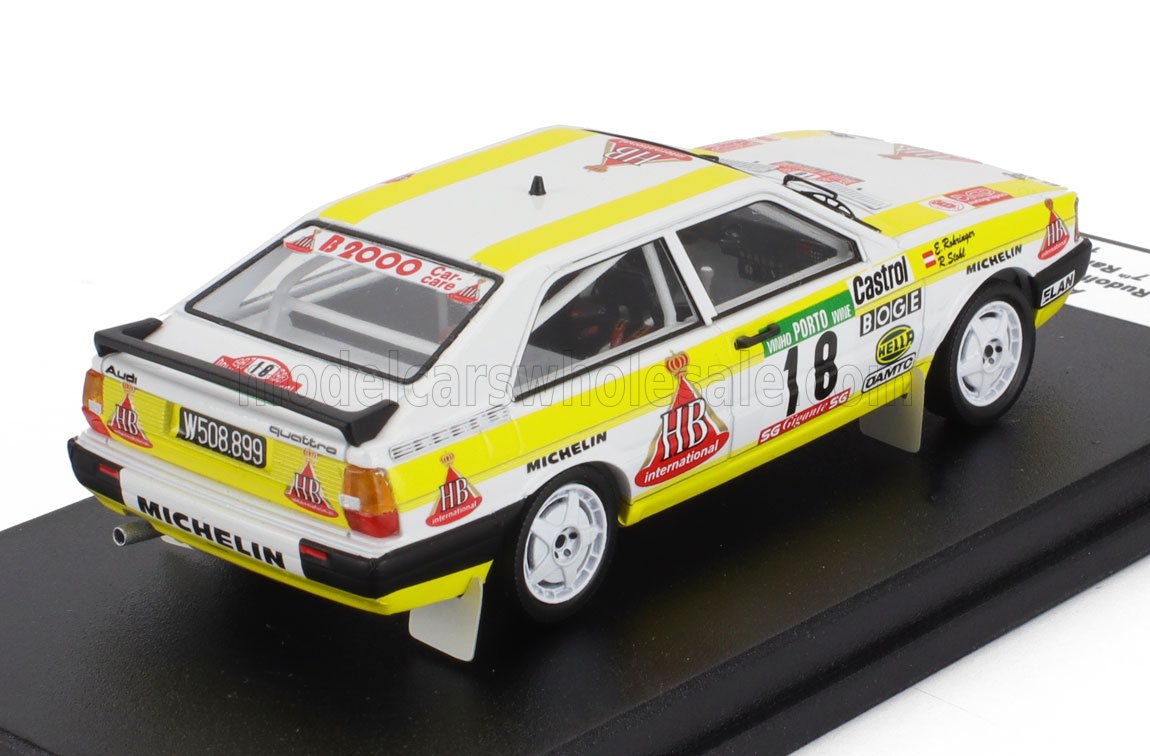 Modello di auto da rally Audi Quattro in scala 1:43 con livrea gialla HB, adesivi dettagliati, su base espositiva, ora su Vroomi.