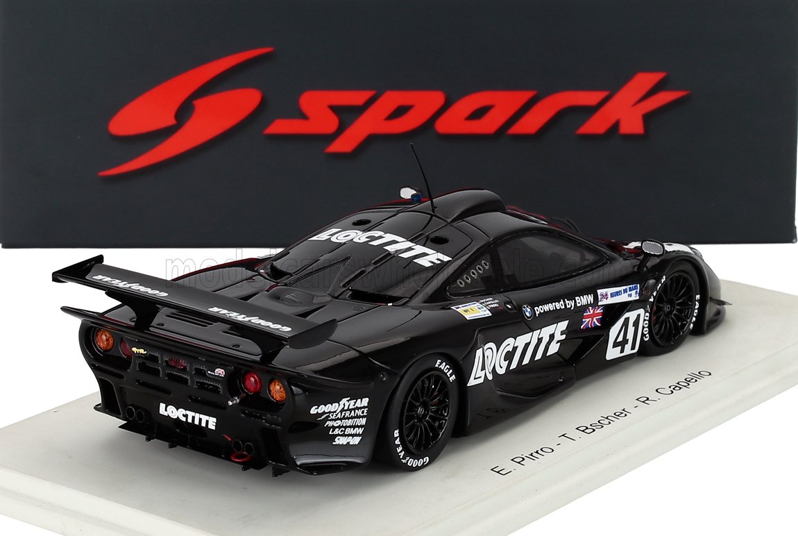 Modellino da corsa nero Loctite con marchio BMW e numero 41 su base espositiva, in vendita su Vroomi.