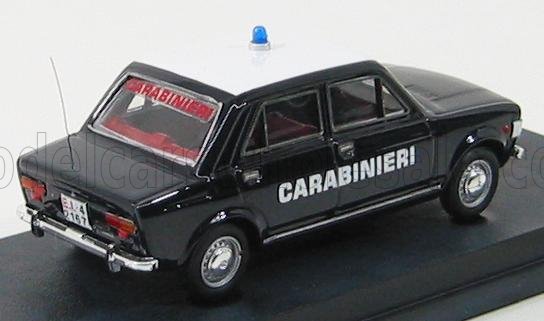 Modellino vintage di auto della polizia dei Carabinieri nera con sirena blu, in mostra e disponibile su Vroomi.