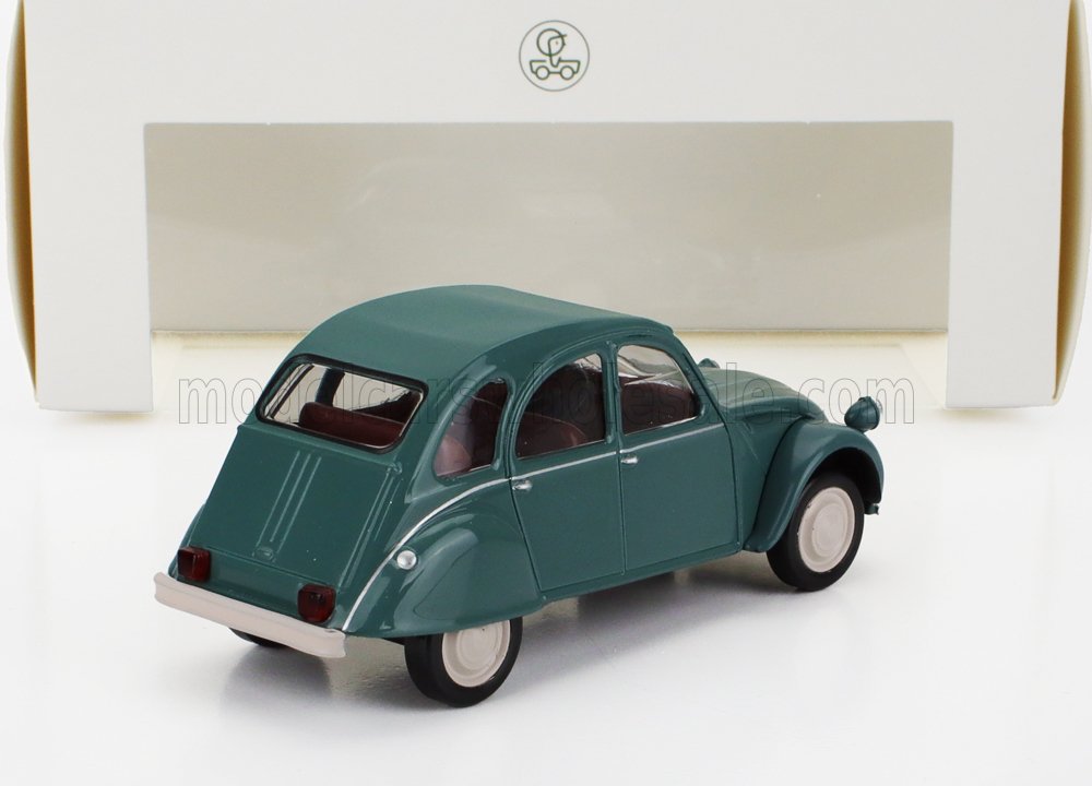 Modellino di Citroën 2CV vintage verde su sfondo color crema, disponibile sulla piattaforma Vroomi.