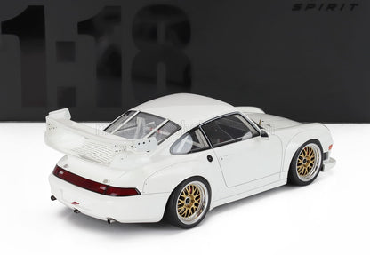 Modellino Porsche 911 in scala 1:18 bianco con cerchi dorati e grande spoiler posteriore disponibile su Vroomi.