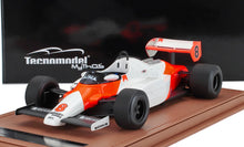 Modellino dell'auto da corsa McLaren MP4 del Gran Premio degli Stati Uniti Tecnomodel , bianco e arancione, in vendita su Vroomi.