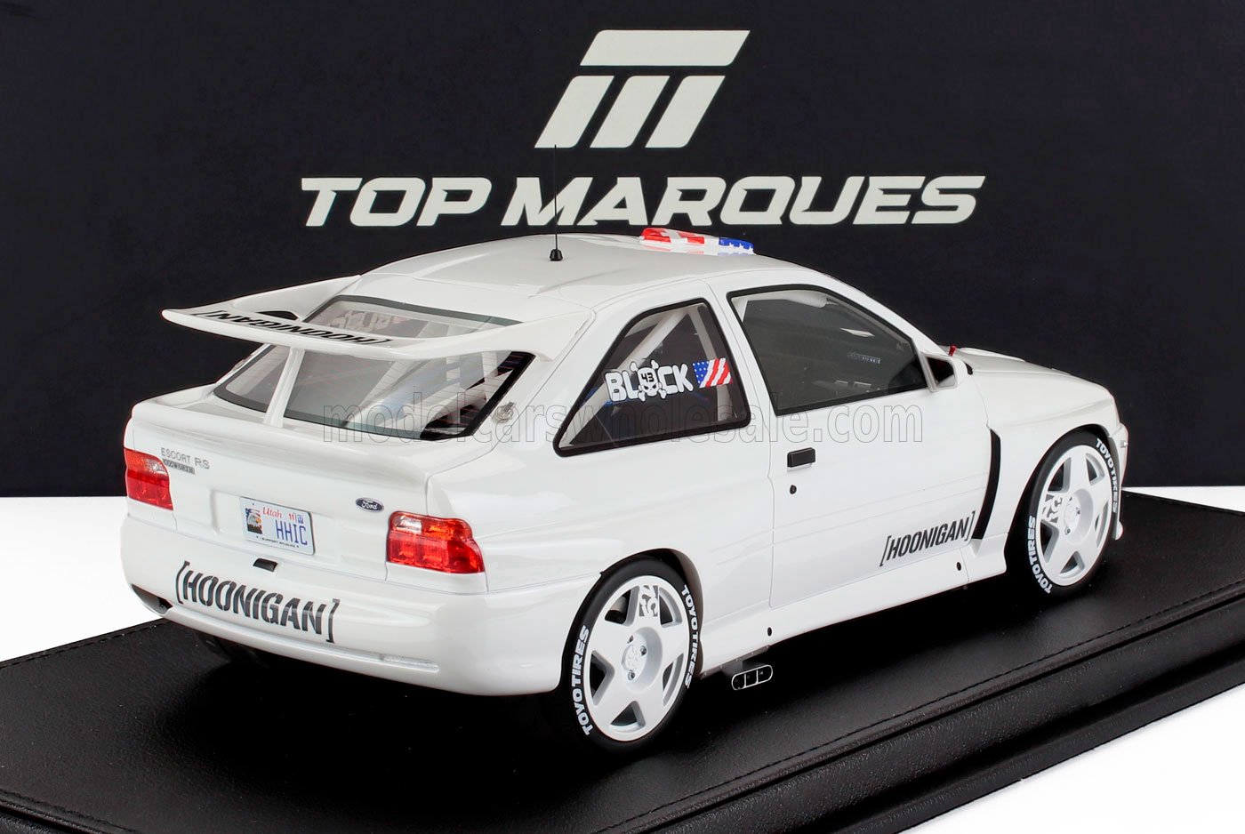 Modellino di Ford Escort RS Cosworth bianca con adesivi Hoonigan e pneumatici Toyo in mostra al Top Marques, disponibile anche su Vroomi.