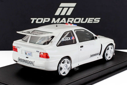Modellino di Ford Escort RS Cosworth bianca con adesivi Hoonigan e pneumatici Toyo in mostra al Top Marques, disponibile anche su Vroomi.